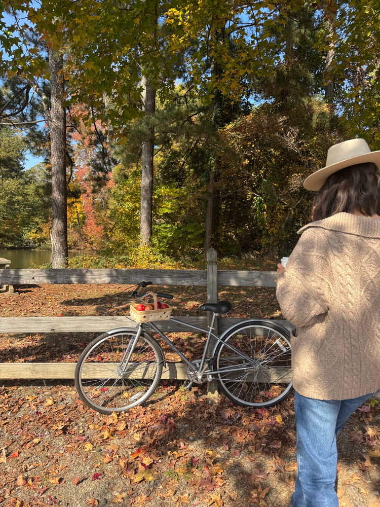 Beige oversized sweater with cable knit look