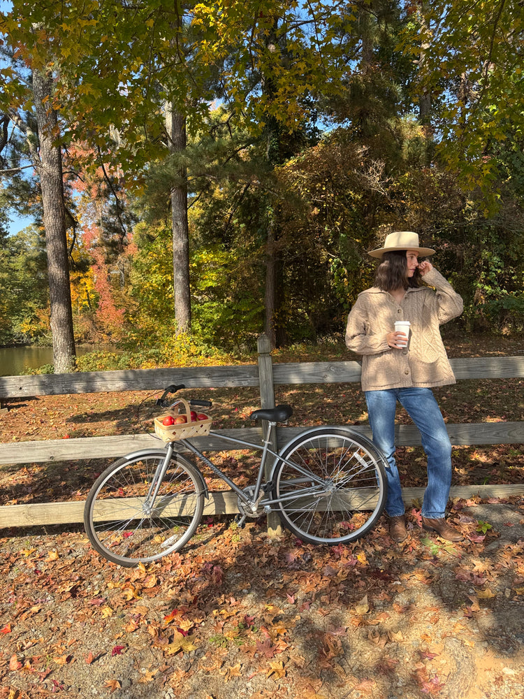 Beige oversized sweater with cable knit look