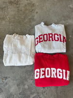 Grey crewneck with red writing