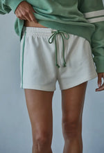 Green striped shorts