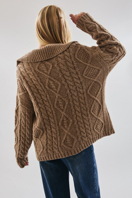 Beige oversized sweater with cable knit look