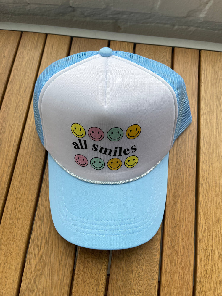 All smiles blue hat